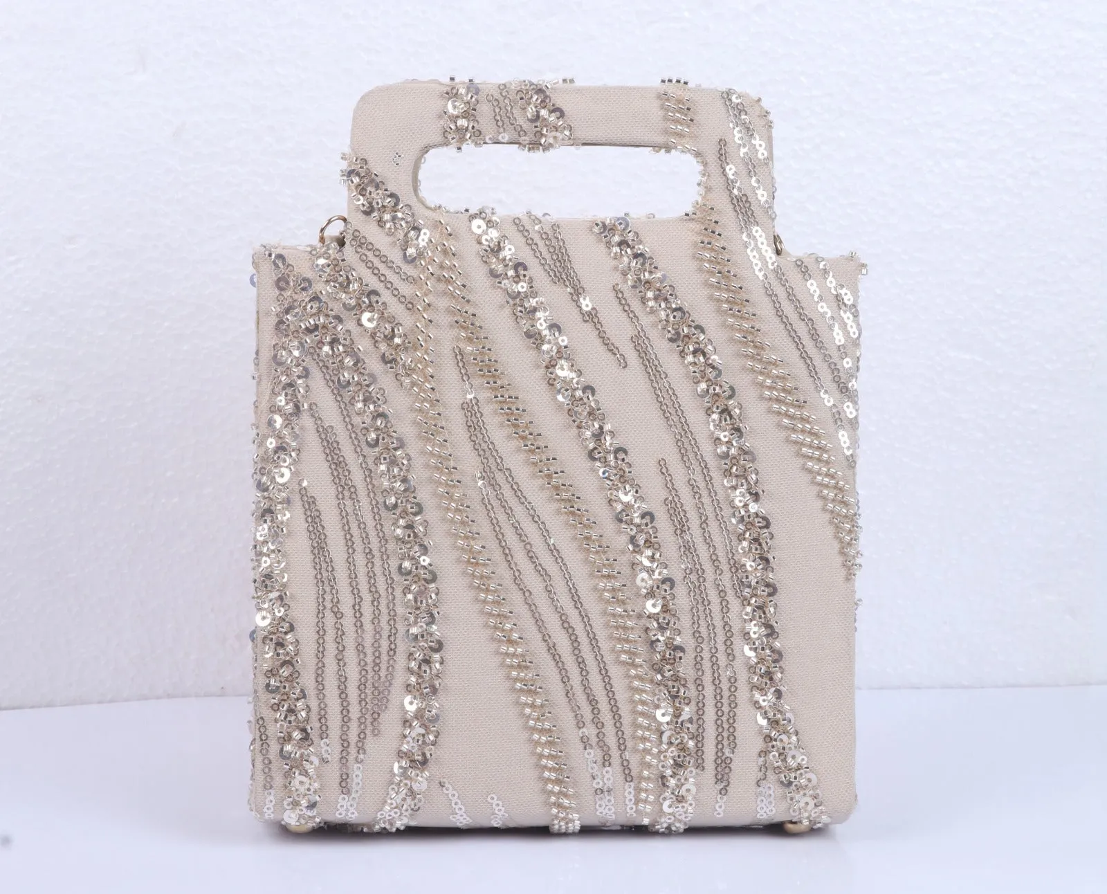 Hand-held Beaded jaal clutch