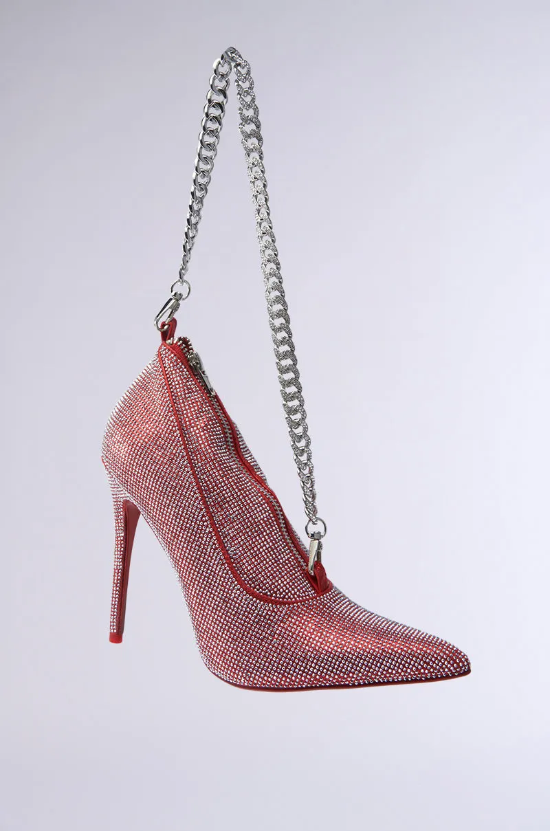 IN MY RED BOTTOMS PURSE