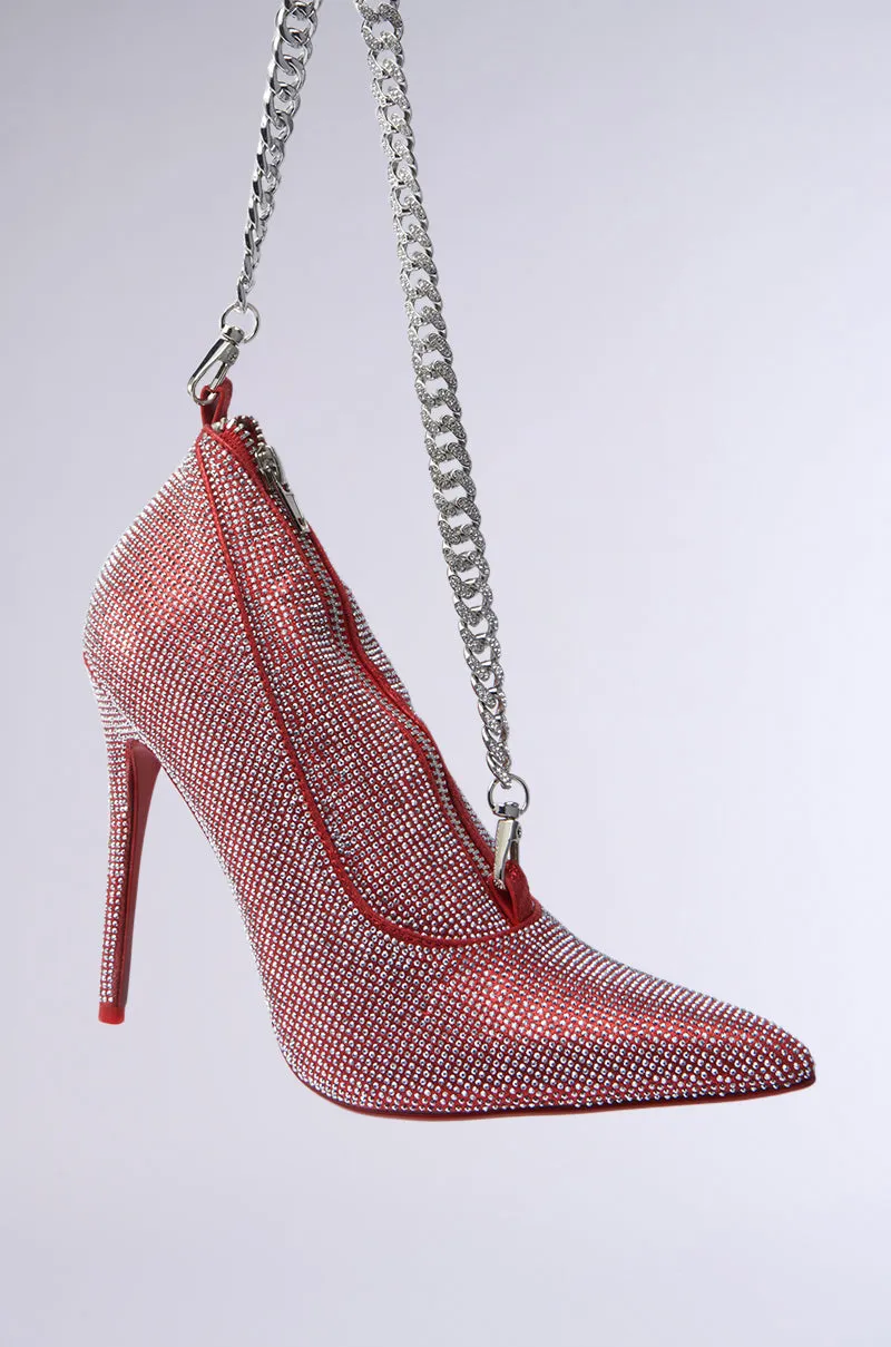 IN MY RED BOTTOMS PURSE