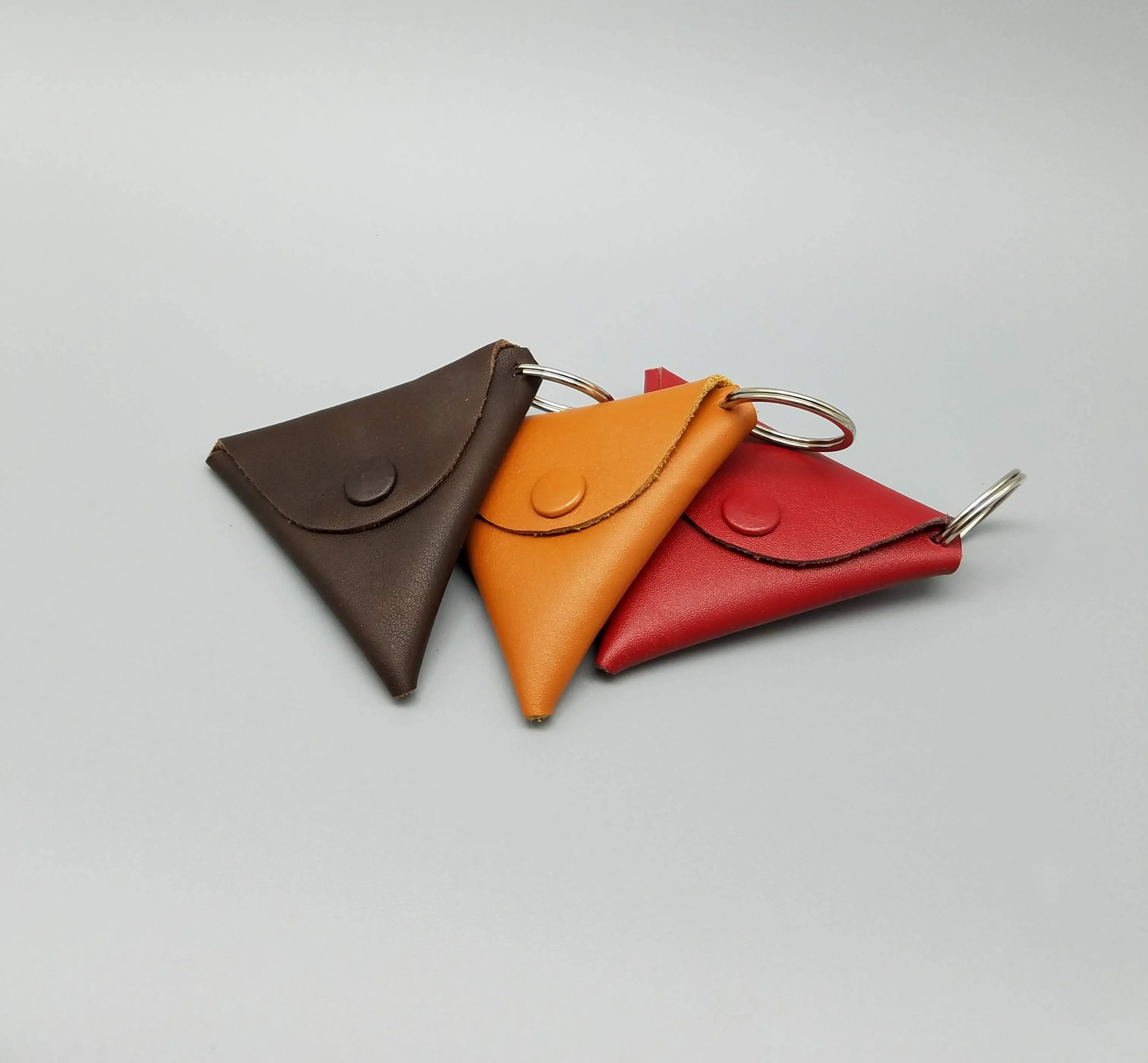 LEATHER TRIANGLE CHANGE POUCH