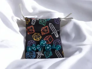 Mini drawstring bag with a set of mini dice, light teal with some glimmer.