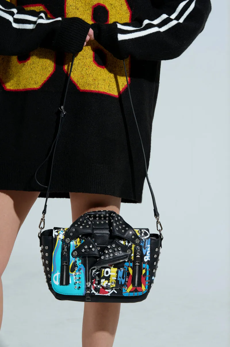 REALLY LIKE THAT PAINTED MOTO BAG