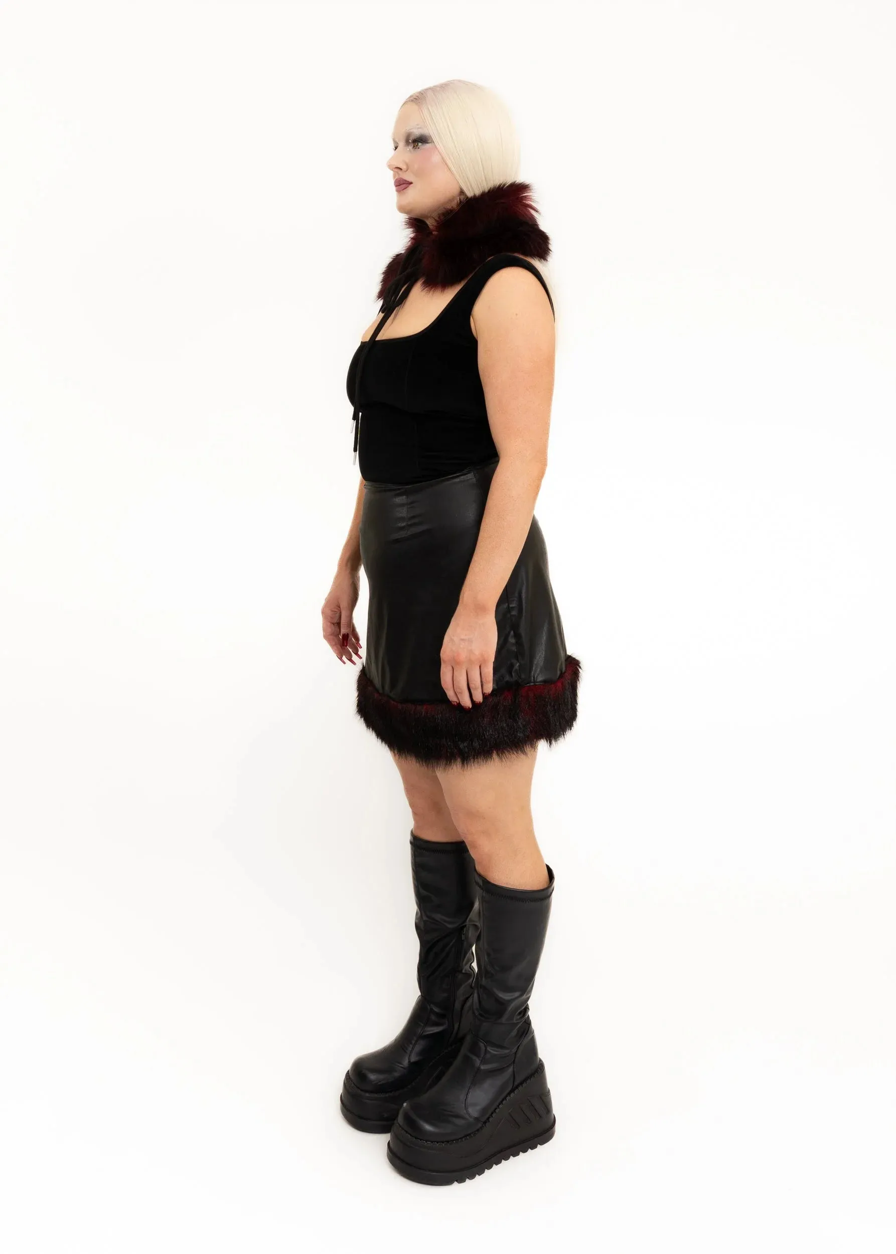 Vinyl skirt with faux fur trim