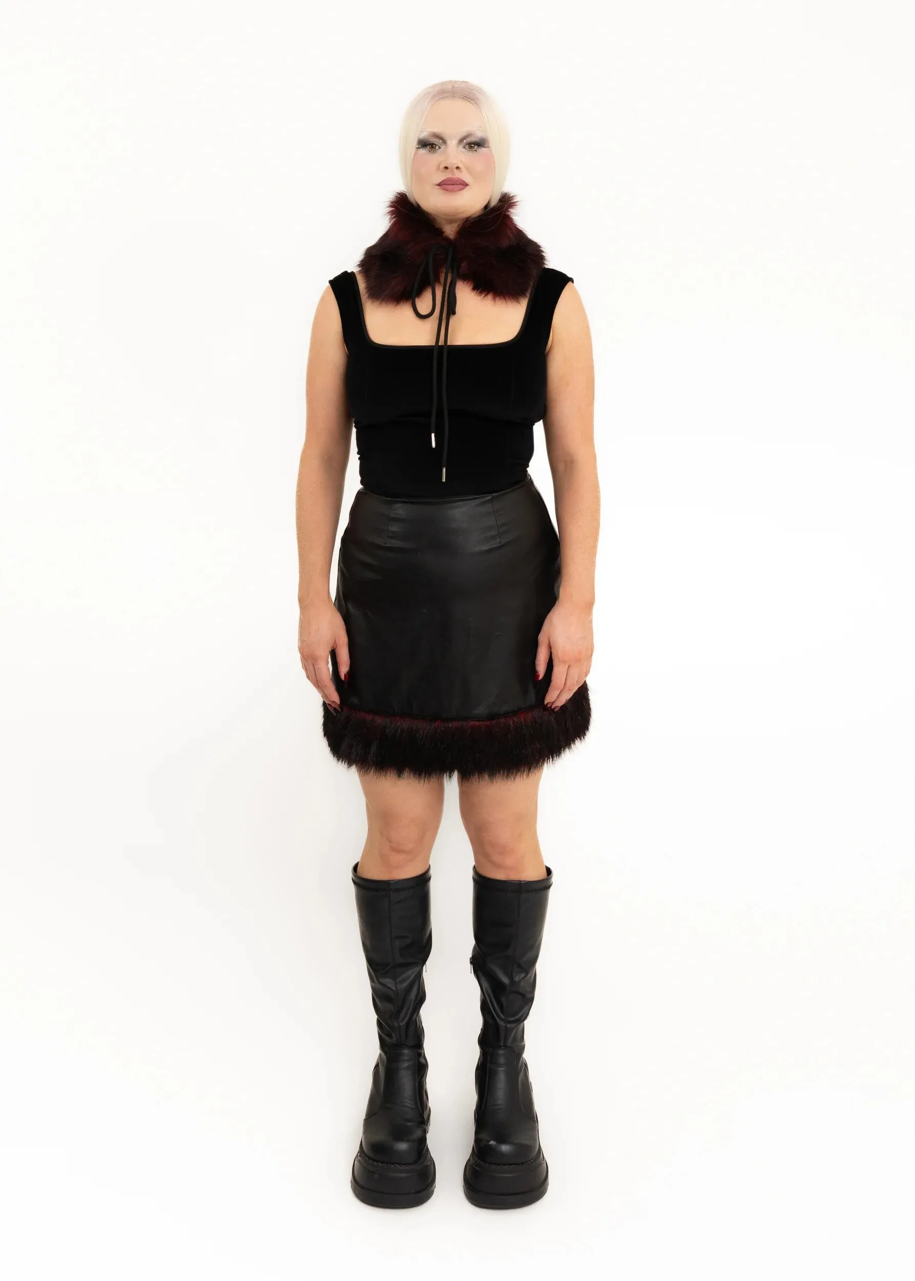 Vinyl skirt with faux fur trim